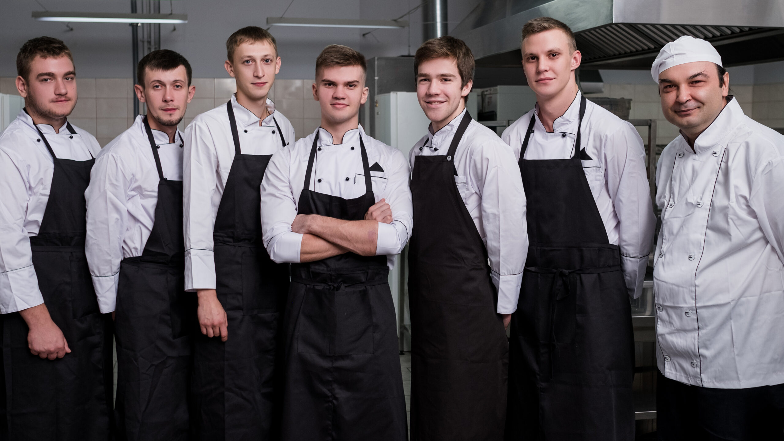 Chef's wearing restaurant uniforms