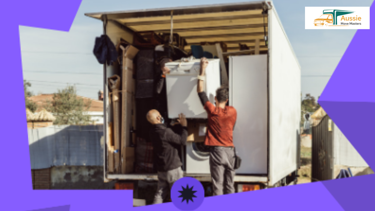 Two professional movers unloading a truck during a relocation, with the Aussie Move Masters logo prominently displayed.